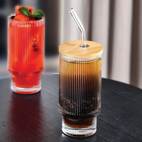 Grace & Joy Company Fluted Vintage Ripple Glass Tumbler with coffee and lid on