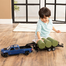 1:16 Big Farm Chevy Pickup and Trailer 47603 boy playing with truck and trailer