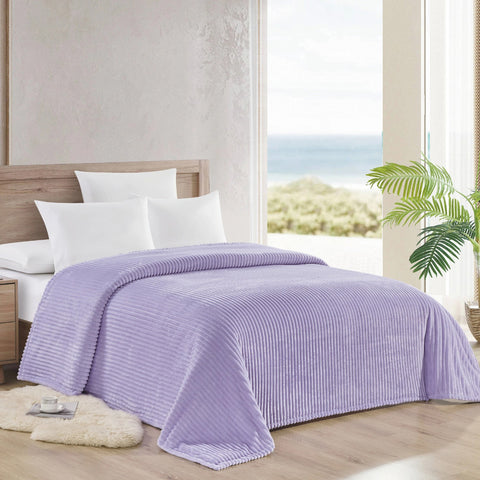 Lilac Striata Blanket on bed
