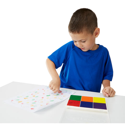 boy with stamp pad