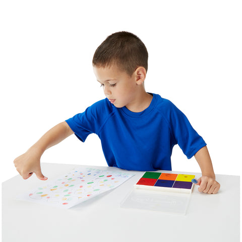 boy with stamp pad