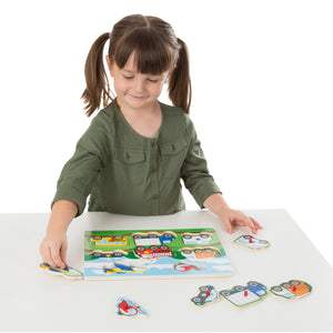 Girl putting together peg puzzle