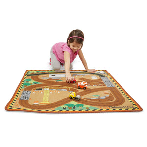 Child playing on rug.