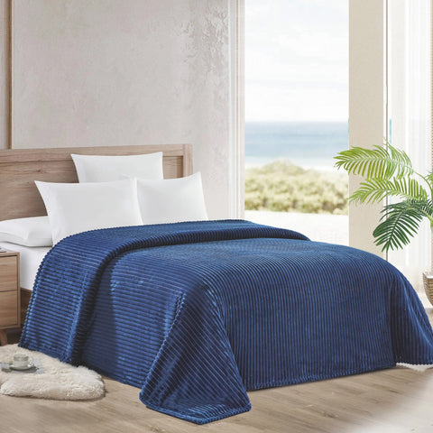 Navy Striata Blanket on bed