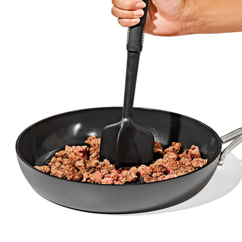 Ground meat chopper and turner chopping meat