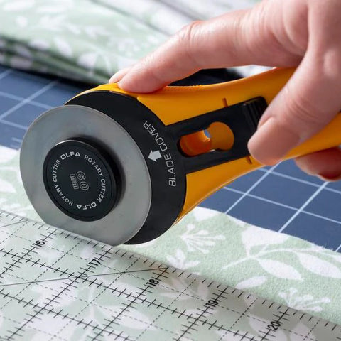 Woman Cutting with Rotary Cutter