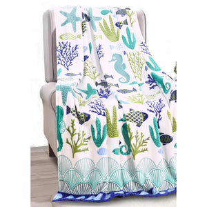 Ocean Coral blanket on chair