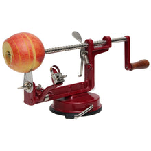Peeling apple with hand-cranked peeler
