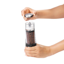 Removing top of pepper grinder