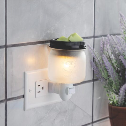 Warmer Plugged Into Wall