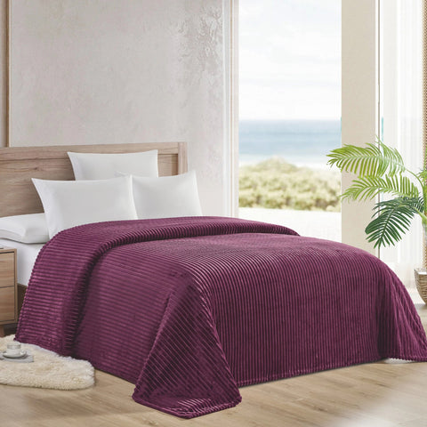 Plum Striata Blanket on bed