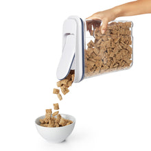 OXO cereal dispenser in use.