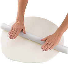 Rolling out white fondant