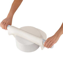 Rolling out fondant icing