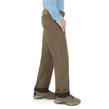 Night brown thermal Wrangler jeans, side view.