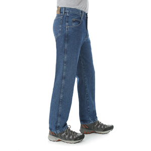 Antique Indigo Relaxed Fit Wrangler blue jeans, side view.