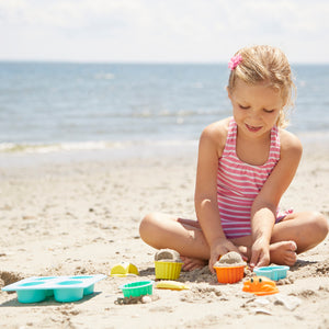 Girl playing at beach