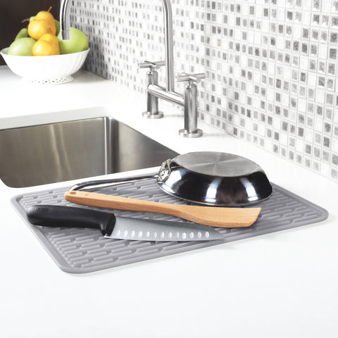 Silicon drying rack next to sink