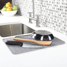 Silicon drying rack next to sink