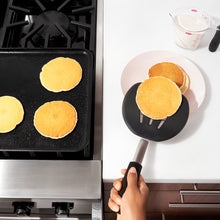 Pancake turner in use