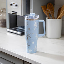 Evergreen 40 oz. Canyon Cup with snowflakes pattern setting on a counter top