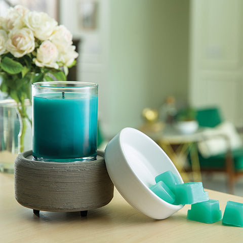 Wax melter with candle