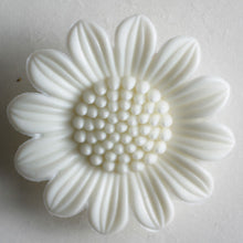 White flower button