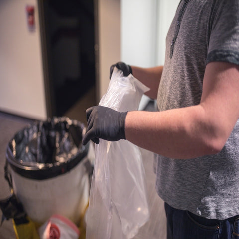 Janitor wearing gloves
