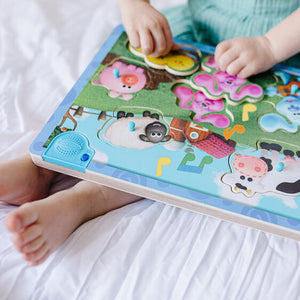 child playing with puzzle