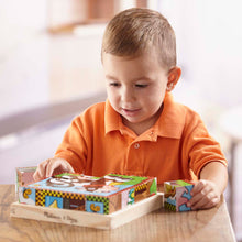 child using farm cube puzzle