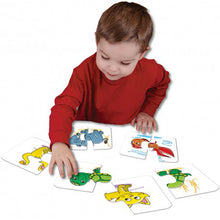 Boy Playing with Puzzle