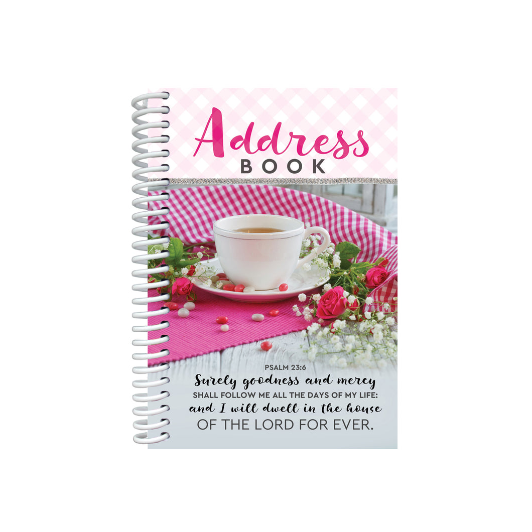 Spiral-bound address book with teacup on front cover.