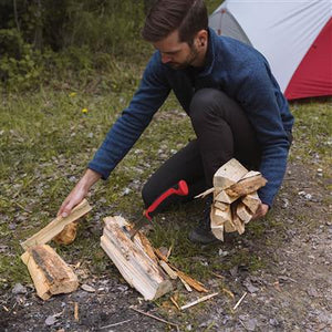 hatchet in use, chopping wood