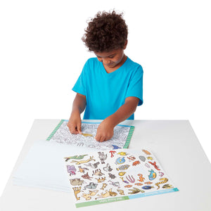boy using sticker pages