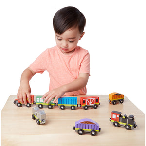 boy with eight train cars