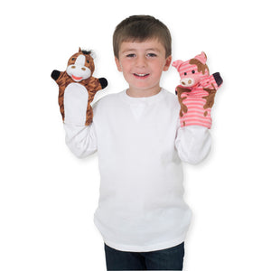 boy with farm friends horse and pig puppets