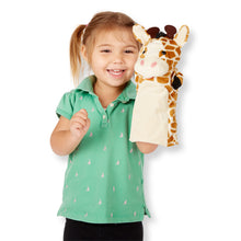 girl with giraffe puppet