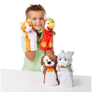 child with hand puppets