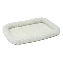 Cream-colored fleece Quiet Time pet bed.