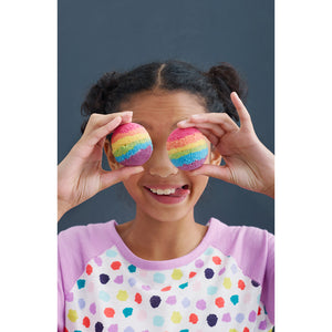 Girl holding bath bombs