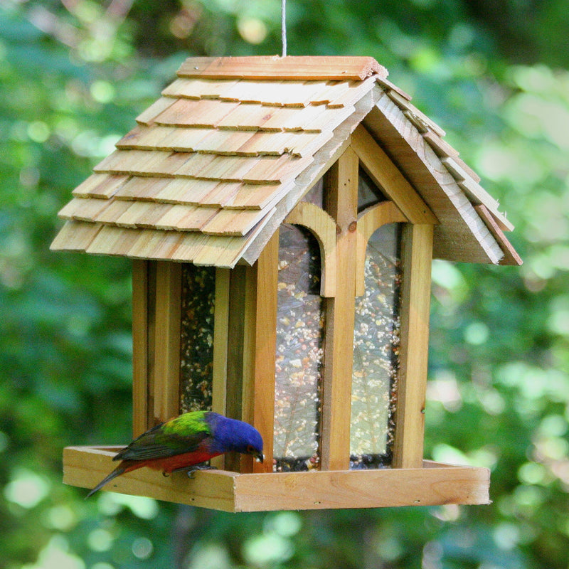 Perky-Pet mountain chapel wooden bird feeder in use