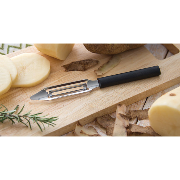 Vegetable peeler with potatoes