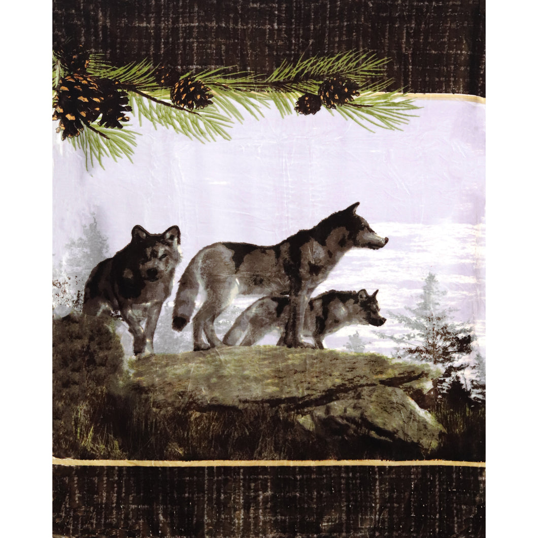 blanket graphic- three wolves looking over the edge of a rock outcropping