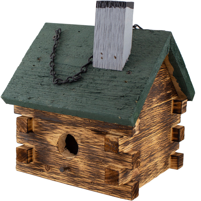 Wooden cabin birdhouse
