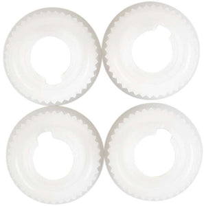 Closeup of four couplers for icing bags