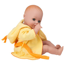 Baby doll sucking her thumb