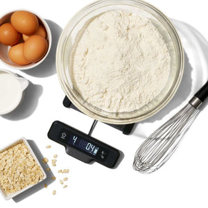 Mixing cake ingredients on food scale