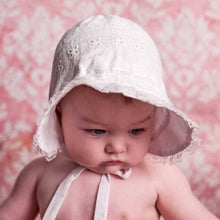 Baby wearing sunhat