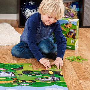 Boy putting puzzle together