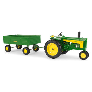 Toy John Deere tractor with wagon
